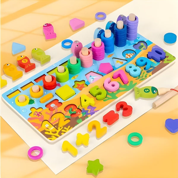 Jogo de empilhamento com argolas do MontessoBox. Desenvolve lógica, equilíbrio e reconhecimento de cores.