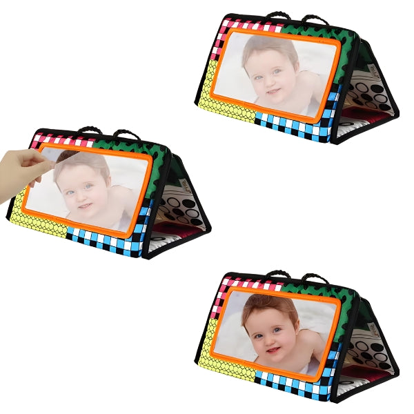 Bebê brincando com o espelho VisuBelly. Ideal para estimular percepção corporal e curiosidade visual.