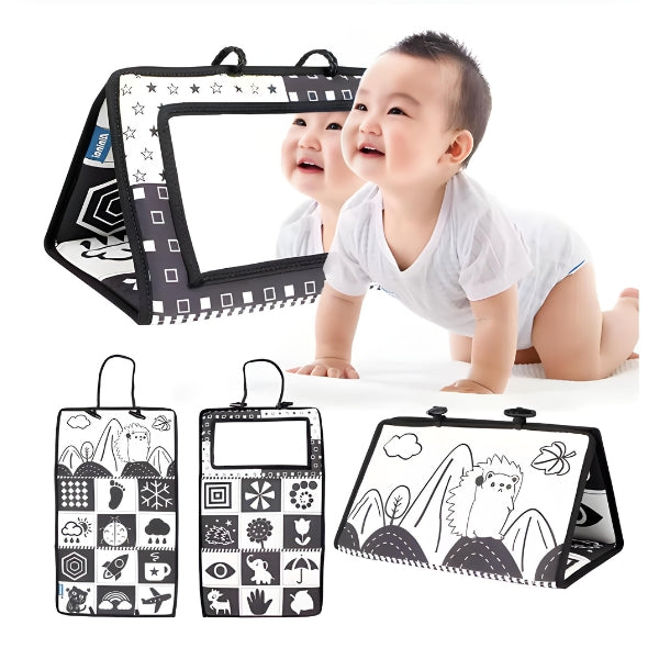 Criança interagindo com o VisuBelly. Promove reconhecimento facial e coordenação motora desde os primeiros meses